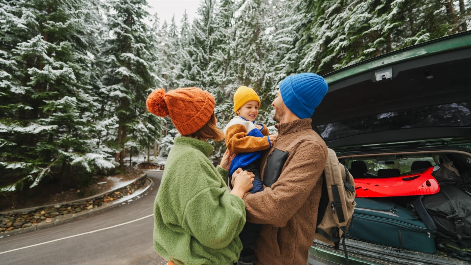 family on winter road trip
